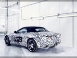 2013-jaguar-f-type-sports-car-rear-side