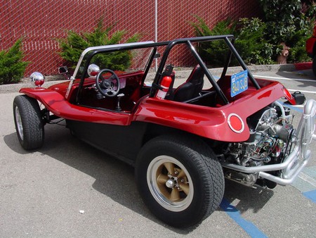 A Dune Buggy features larger wide tires and therefore can easily navigate 