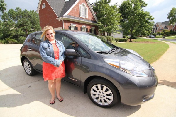 Allison Howard with her Nissan LEAF Credit Nissan Americas 600x400 at 100,000th Electric Vehicle Delivered by Renault Nissan