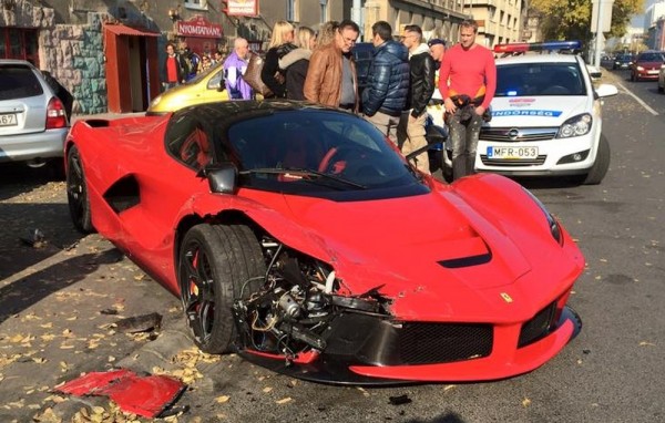 Red LaFerrari crash 0 600x382 at Red LaFerrari Gets its Face Ripped Off in Budapest