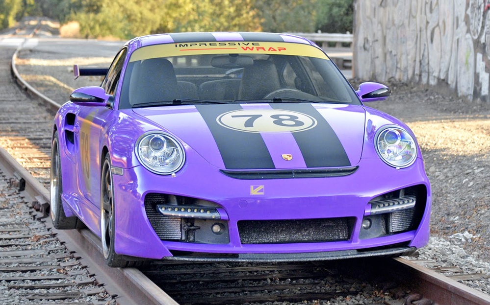Purple Porsche Turbo on Rails at Sights and Sounds: Purple Porsche Turbo on Train Tracks!