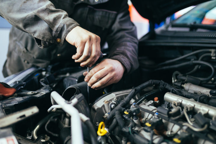 car mechanic 730x487 at Our Guide To Fixing Your Car On A Shoestring Budget