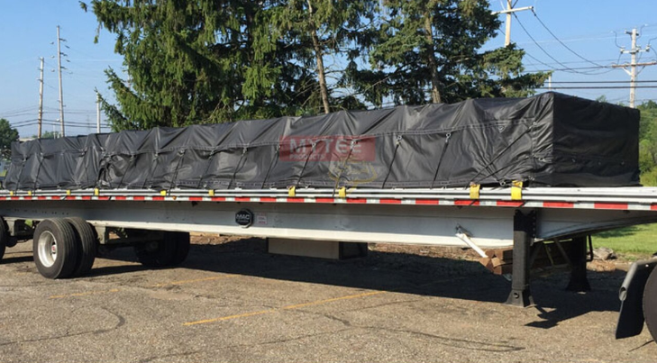 metal tarps at Types of Truck Tarps to Secure the Cargo