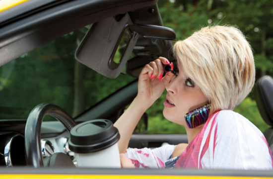 distracted driver 550x360 at What You Need to Know About Distracted Driving in Oklahoma