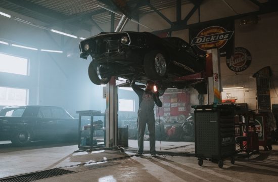 mechanic under car 550x360 at 8 Things You Should Consider to Protect Your Car During the Summer