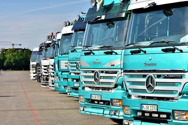 trucks parked at The different types of truckers and their insurance needs